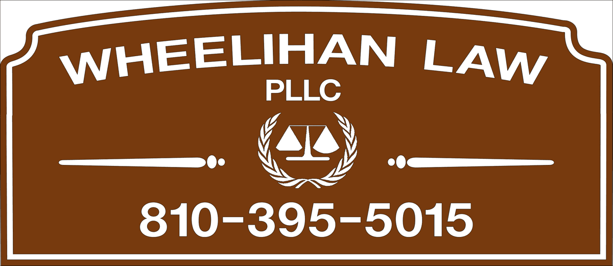 Wheelihan Law, PLLC office sign in Capac, Michigan with phone number 810-395-5015